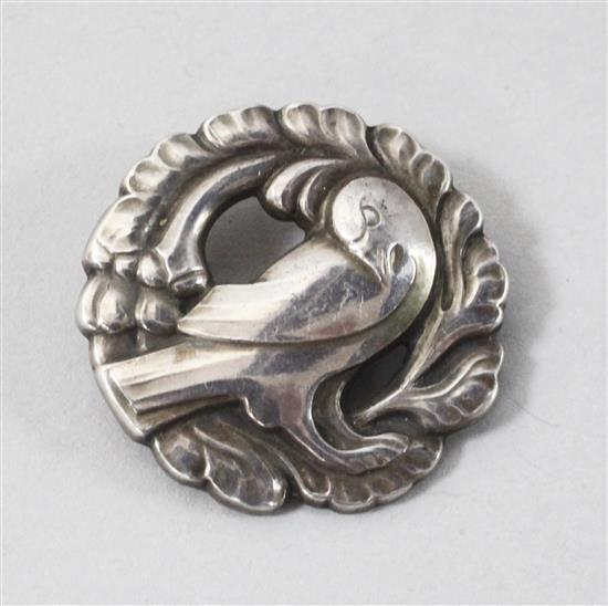 A Danish Georg Jensen sterling silver circular dove brooch, no. 134, 30mm.